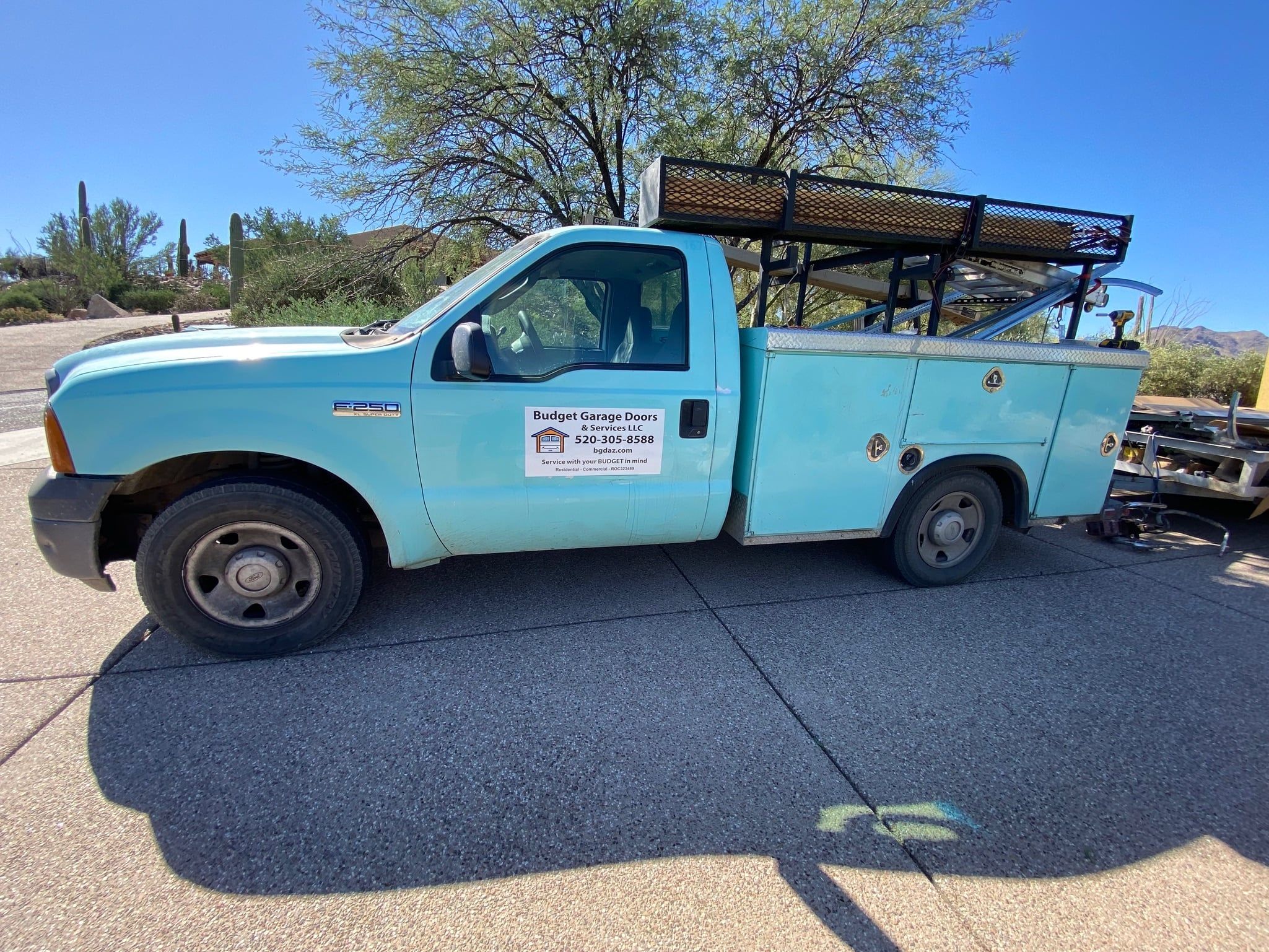 budget garage doors & services work truck for Tucson arizona